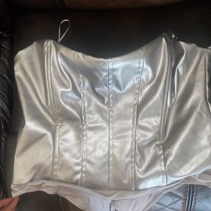 Metallic silver body suit